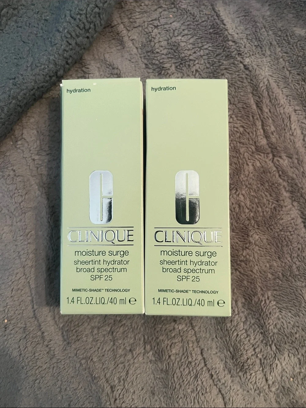 Clinique Moisture Surge Sheertint Hydrator - broad spectrum SPF 25